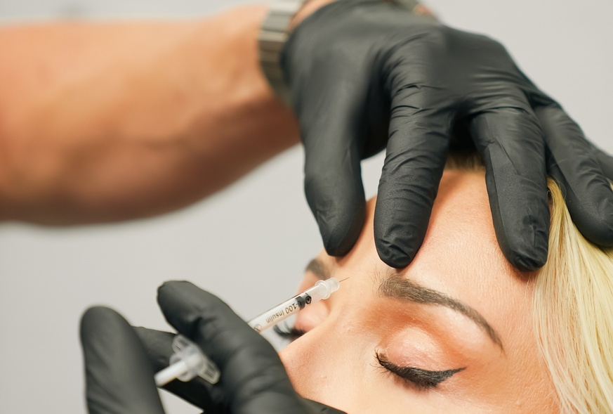Patient receiving Botox injections near the eye area at Refresh - Aesthetics & Wellness in Florida